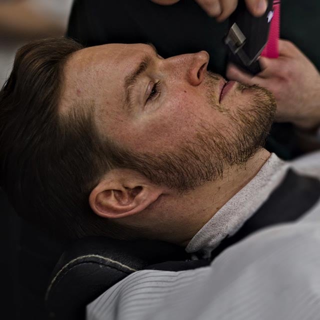 A man in a barbershop